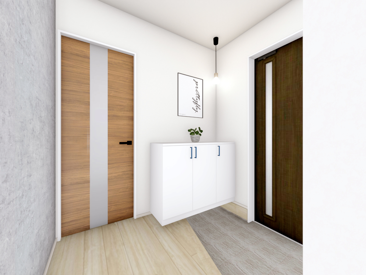 モルタル調のアクセントクロスが 印象的な玄関。ペンダントライトでオシャレな空間に。