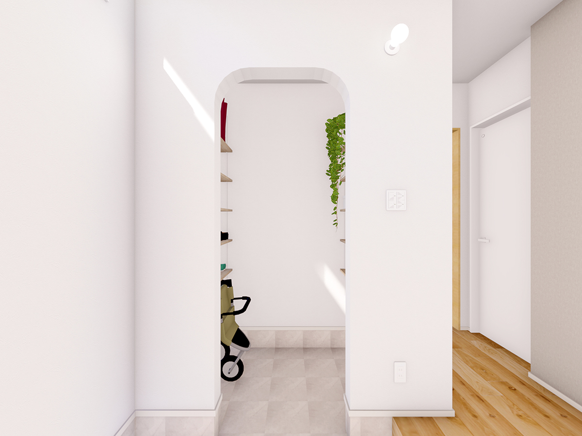 ベビーカーやアウトドア用品も まとめて収納。R加工の垂れ壁が かわいい土間収納です。